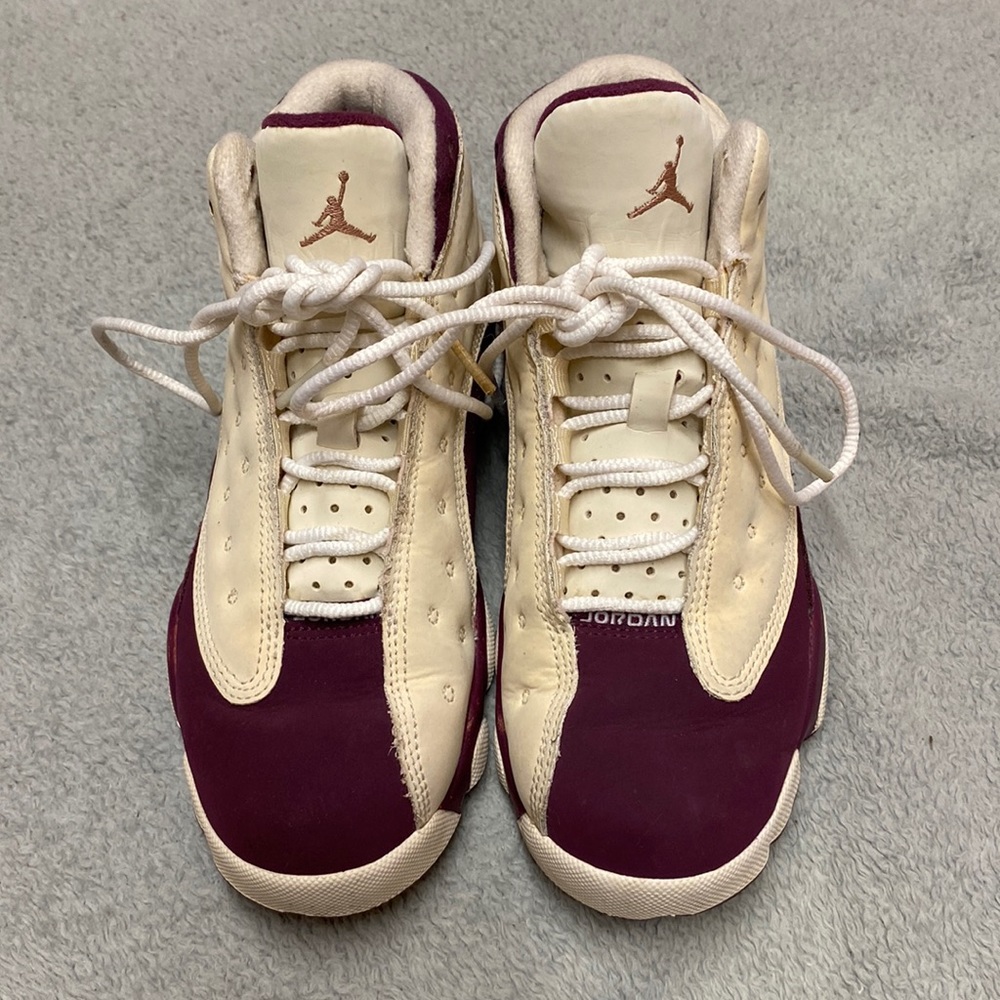 Boys purple and white Jordan’s size 2
